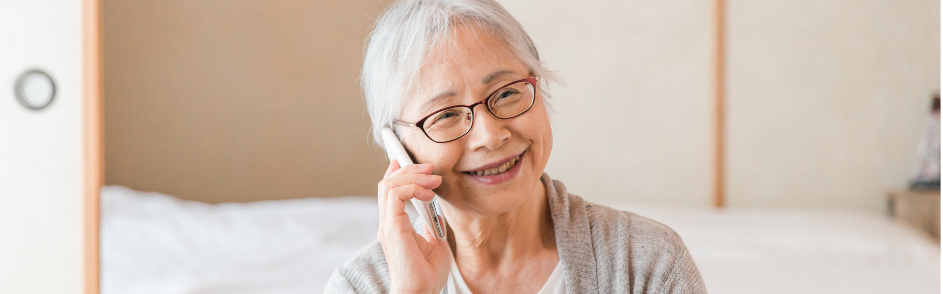 senior woman calling using her smart phone